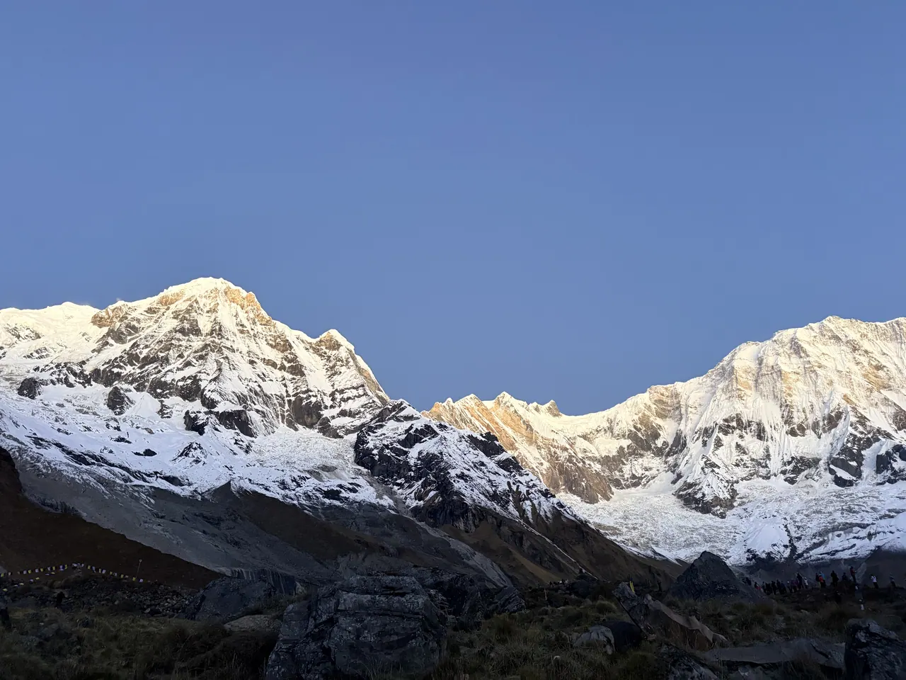 First light on Annapurna South and Annapurna I from base camp